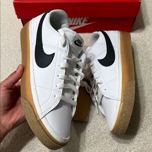 Nike White Sneakers with Black Swoosh and Tan Sole